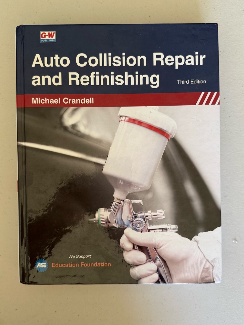 Auto Collision Repair and Refinishing by Michael Crandell - Navy & Red Cover